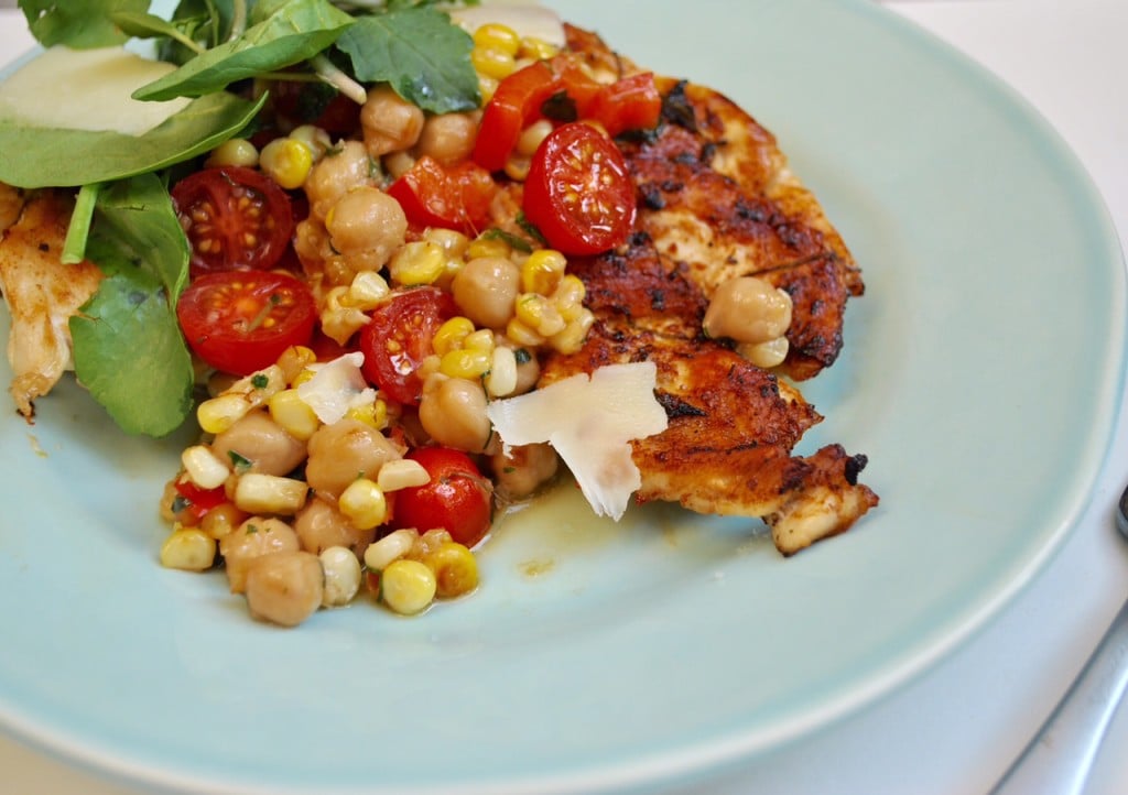 Lifestyle Blogger Jenny Meassick of the Weekend Blog, Chocolate and Lace shares her easy and delicious recipe for Grilled Chicken Cutlets with Cherry Tomato, Corn and Chickpea Sauce.