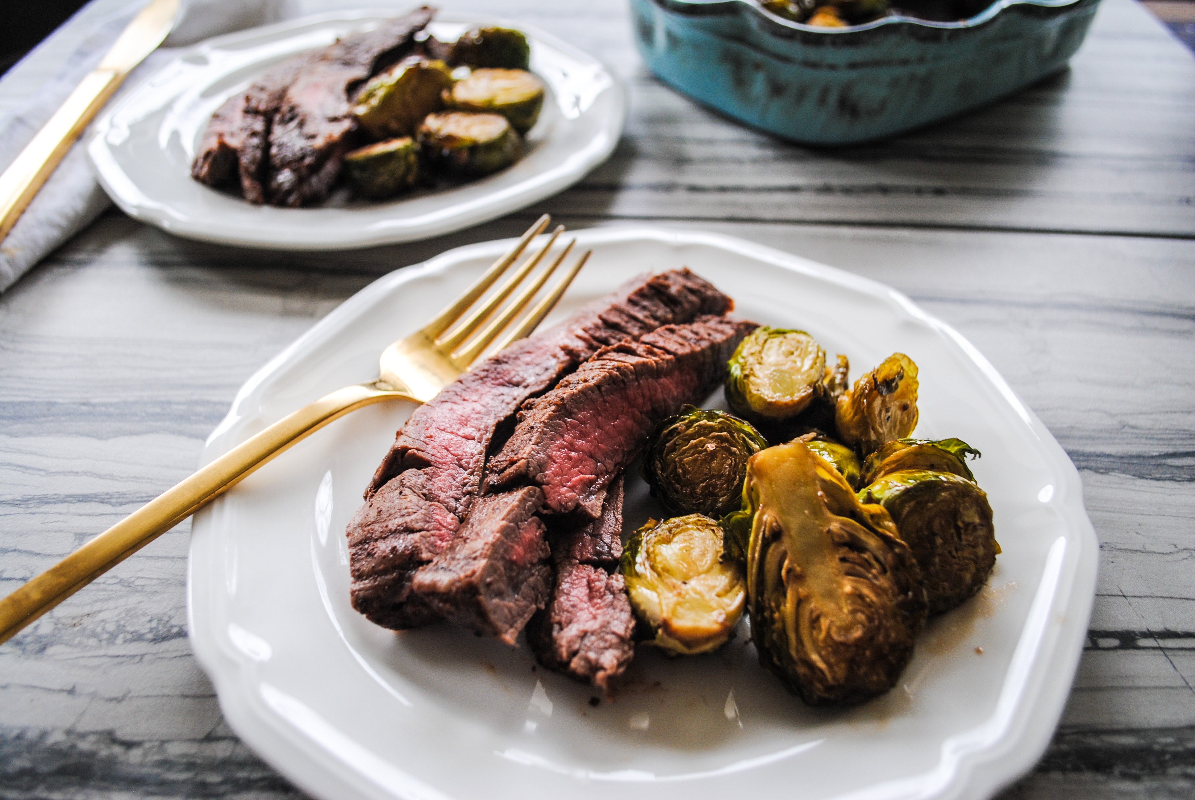 Food Blogger Jenny Meassick of Chocolate and Lace shares her recipe for Flank Steaks and Honey Balsamic Brussel Sprouts