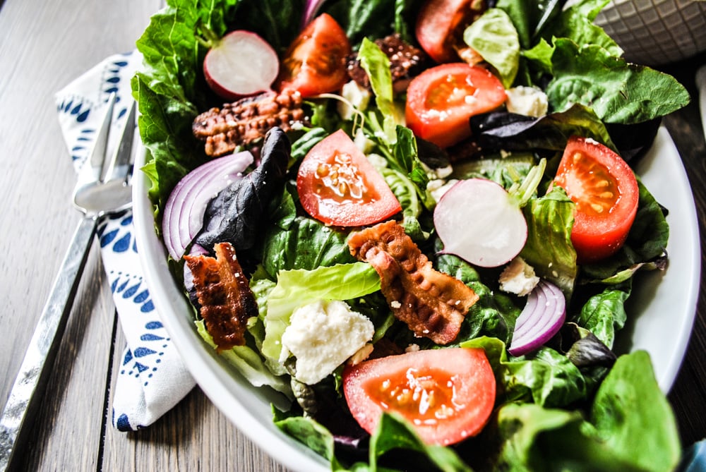 Lifestyle Blogger Jenny Meassick of Chocolate and Lace shares her recipe for BLT salad featuring Backyard Farms Tomatoes. 