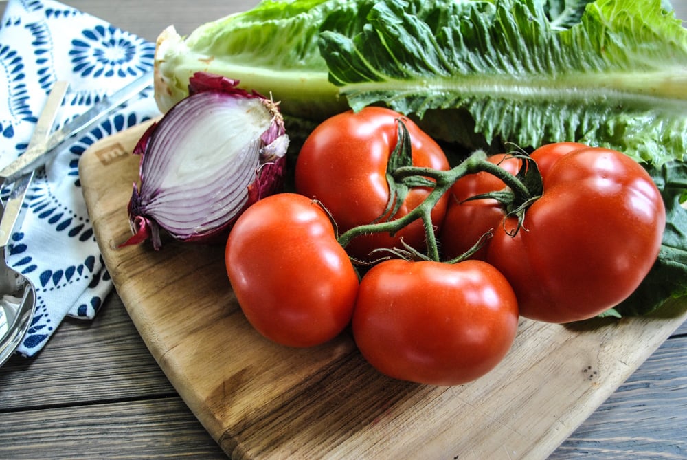 Lifestyle Blogger Jenny Meassick of Chocolate and Lace shares her recipe for BLT salad featuring Backyard Farms tomatoes. 