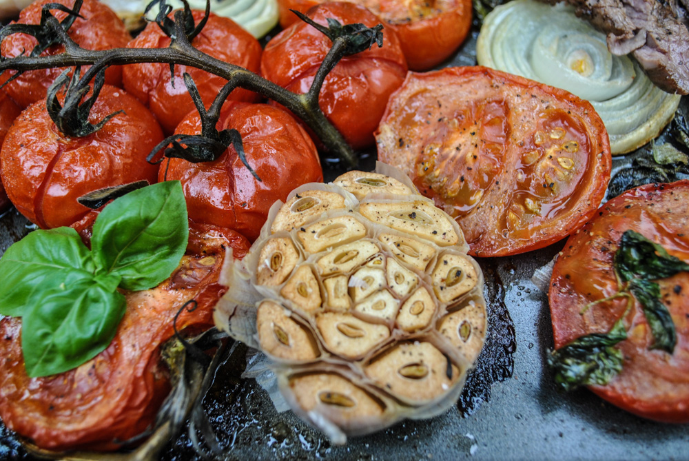 Lifestyle Blogger Jenny Meassick of Chocolate and Lace shares her recipe for Roasted Tomatoes, Garlic and Herbs