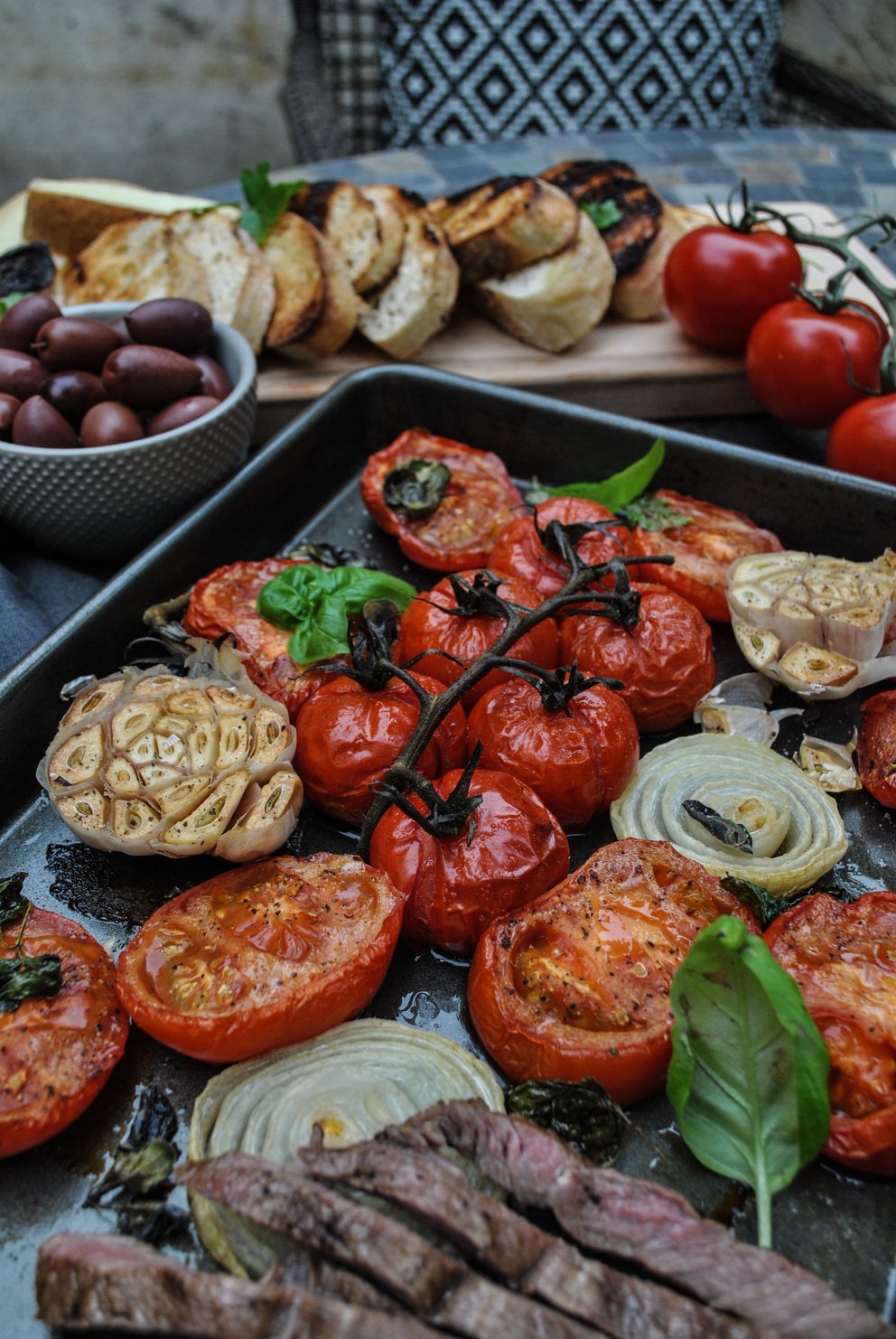 Lifestyle Blogger Jenny Meassick of Chocolate and Lace shares her recipe for Roasted Tomatoes, Garlic and Herbs