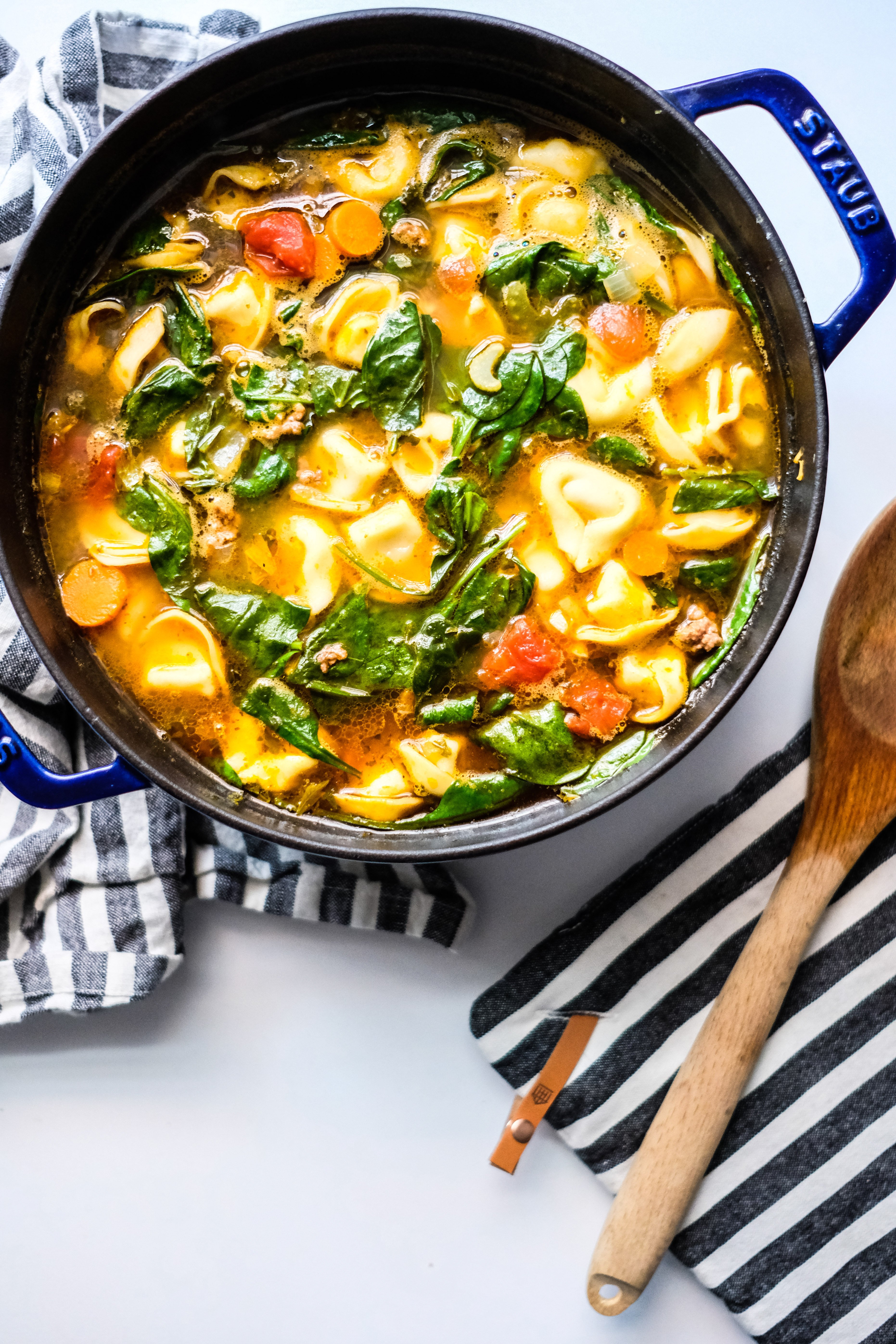 Lifestyle blogger Chocolate & Lace shares a delicious recipe for hearty Tortellini and Arugula Soup.