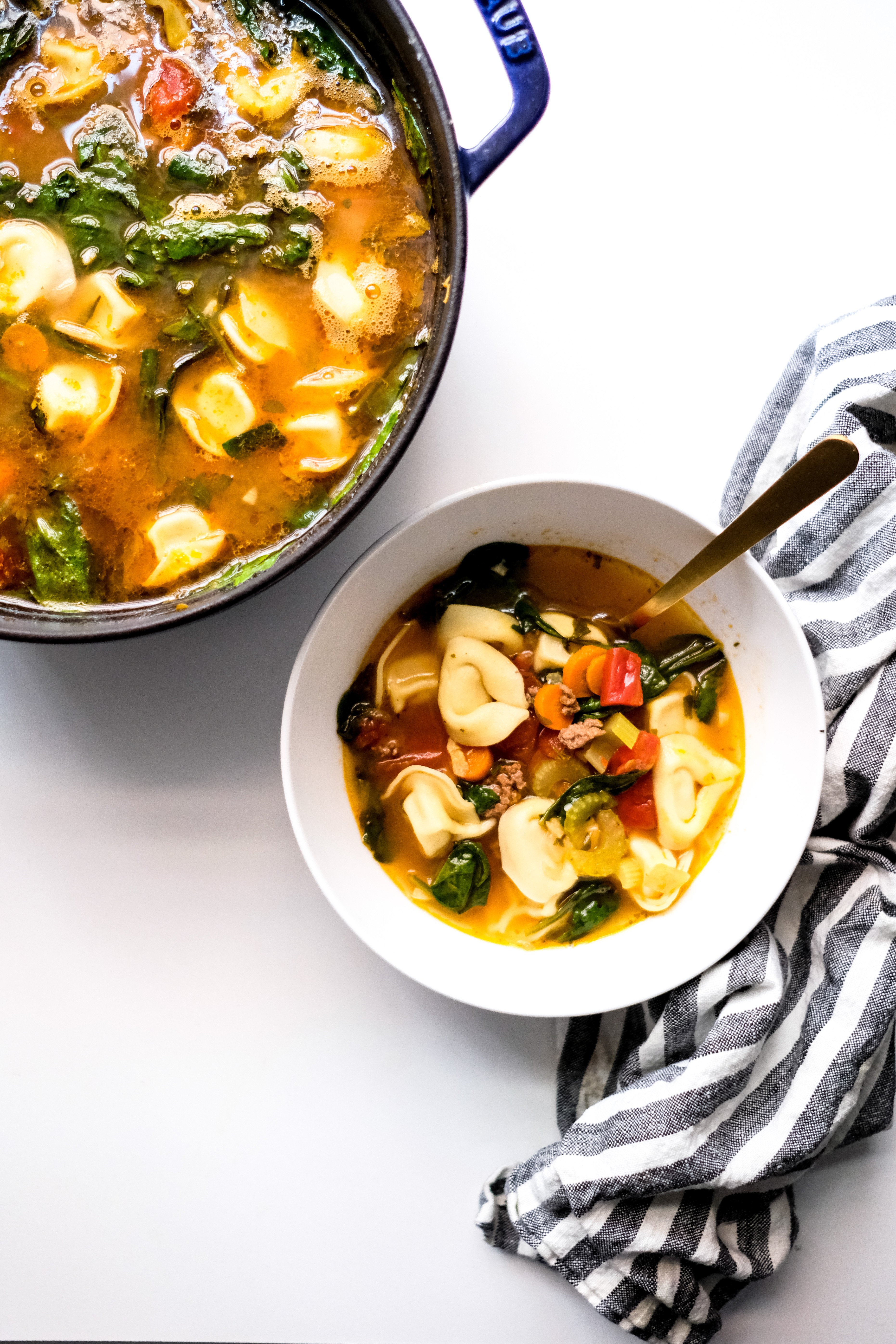 Lifestyle blogger Chocolate & Lace shares a delicious recipe for hearty Tortellini and Arugula Soup.