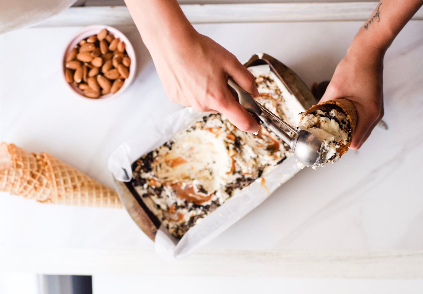 Lifestyle Blogger Chocolate and Lace shares her recipe for Oreo Salted Almond Caramel Swirl Homemade Ice Cream.