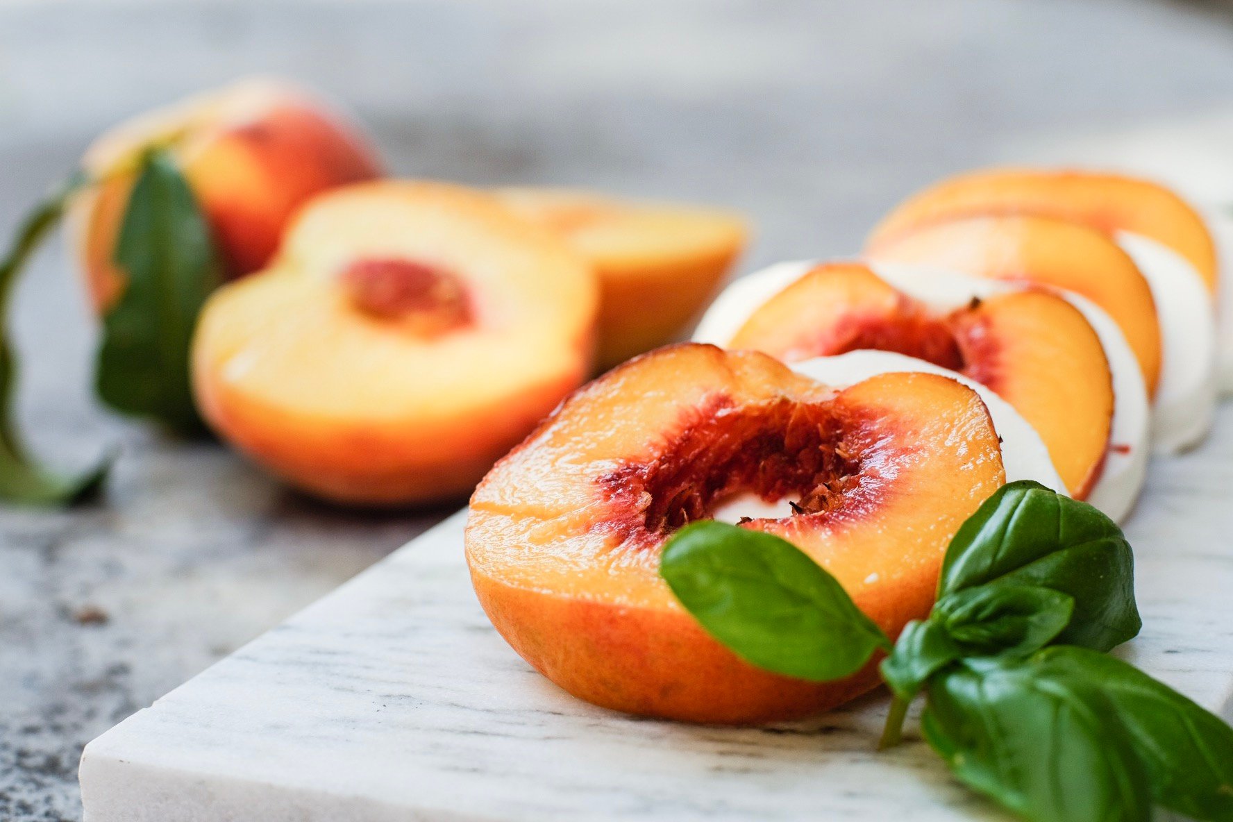 Lifestyle Blogger Chocolate and Lace shares her recipe for Peach Caprese Salad