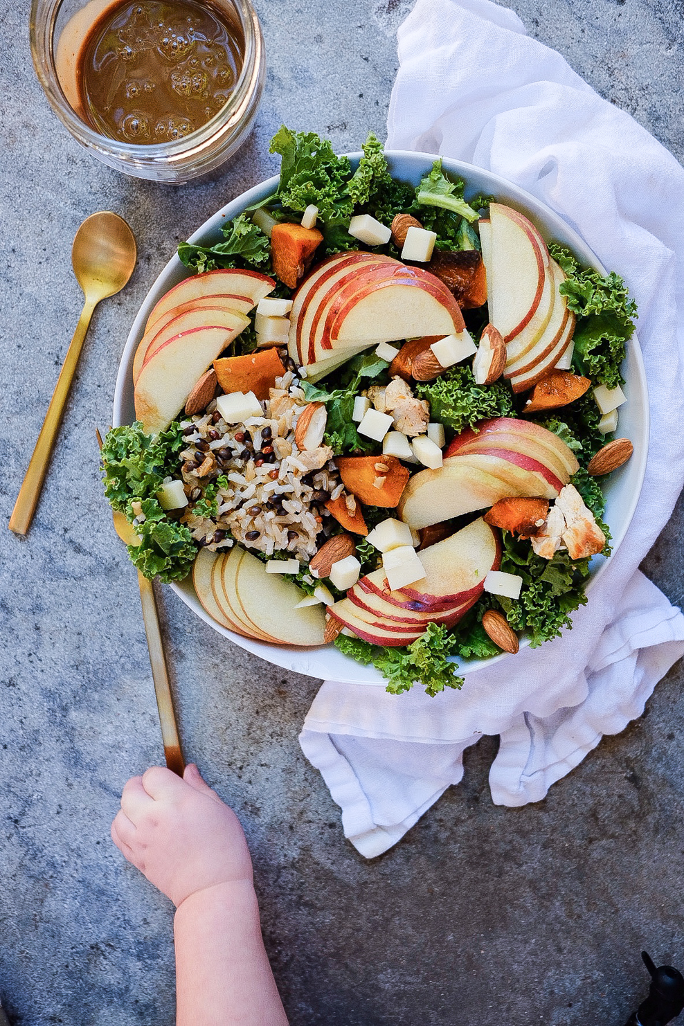 Recipe for Copycat Sweetgreen Harvest Bowl with leafy greens and apples. 