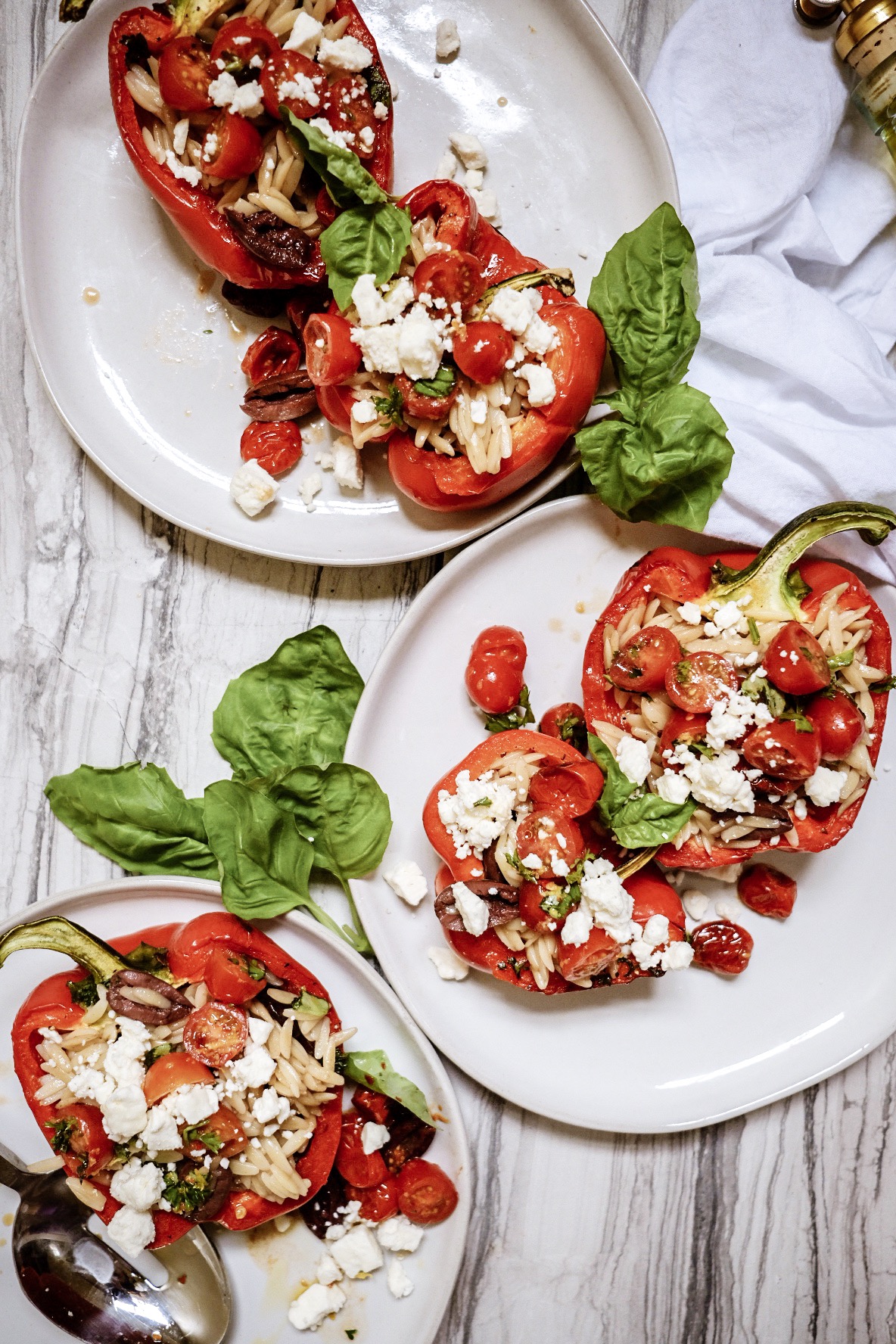 Lifestyle Blogger Jenny Meassick from Chocolate & Lace shares her recipe for Roasted Stuffed Peppers.