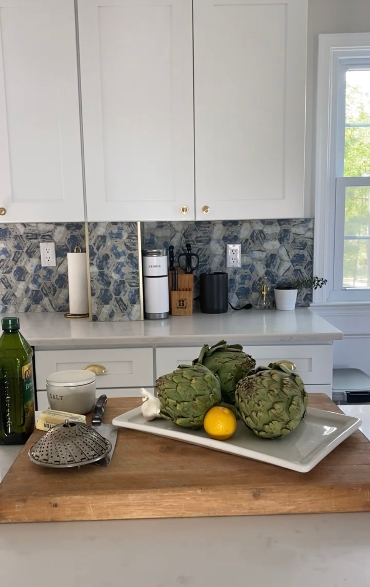 tools placed on a counter top to steam artichokes. 